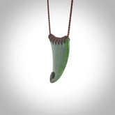 This pendant is a sized niho with koru heart necklace carved from a deep green piece of New Zealand Jade. Kyohei Noguchi carved this piece for us so the workmanship is outstanding. Handmade in New Zealand, a beautiful piece of jade jewellery.